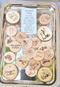 Dog themed etched wood gifts are available at my market booth